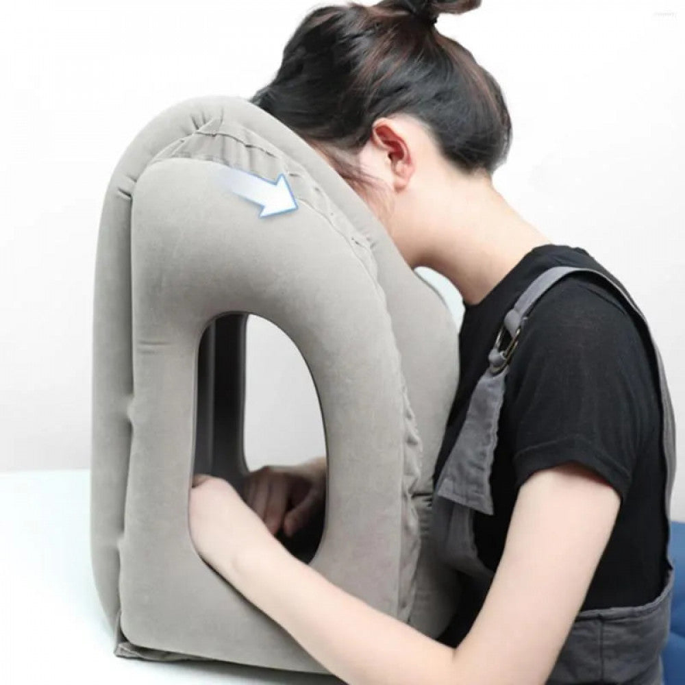 Inflatable hug pillow with arm hole