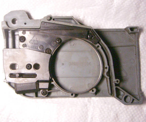 Electric chain saw tensioner assembly with cover Rebir