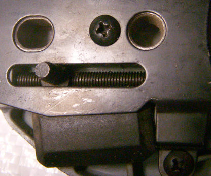 Electric chain saw tensioner assembly with cover Rebir