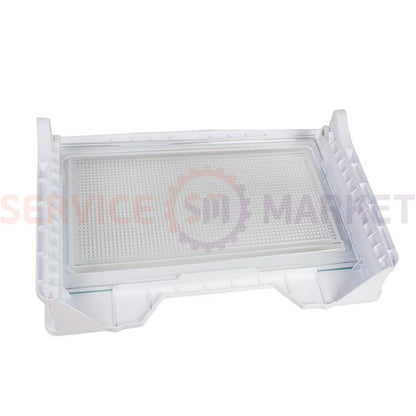 Shelf above the vegetable drawer in the LG refrigerator